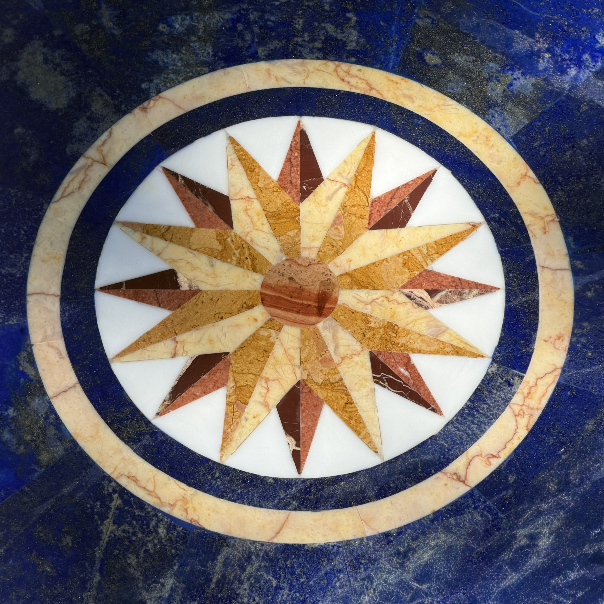 Handcrafted black marble table with lapis lazuli and semi-precious stone inlay