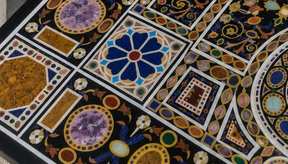 Handcrafted black marble dining table with pietra dura inlay work and geometric motifs