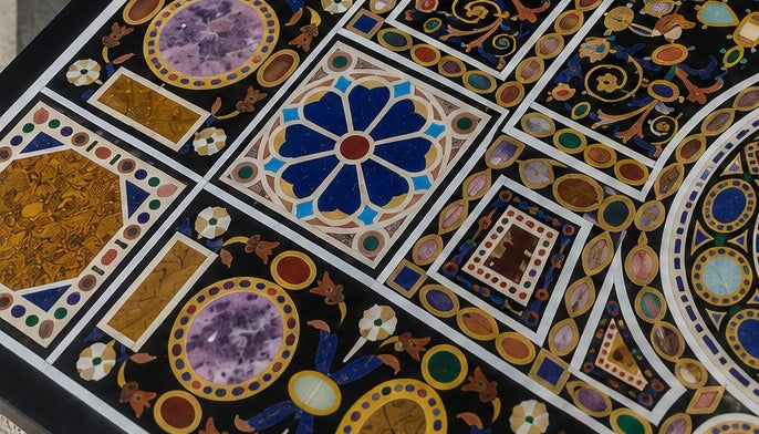 Handcrafted black marble dining table with pietra dura inlay work and geometric motifs