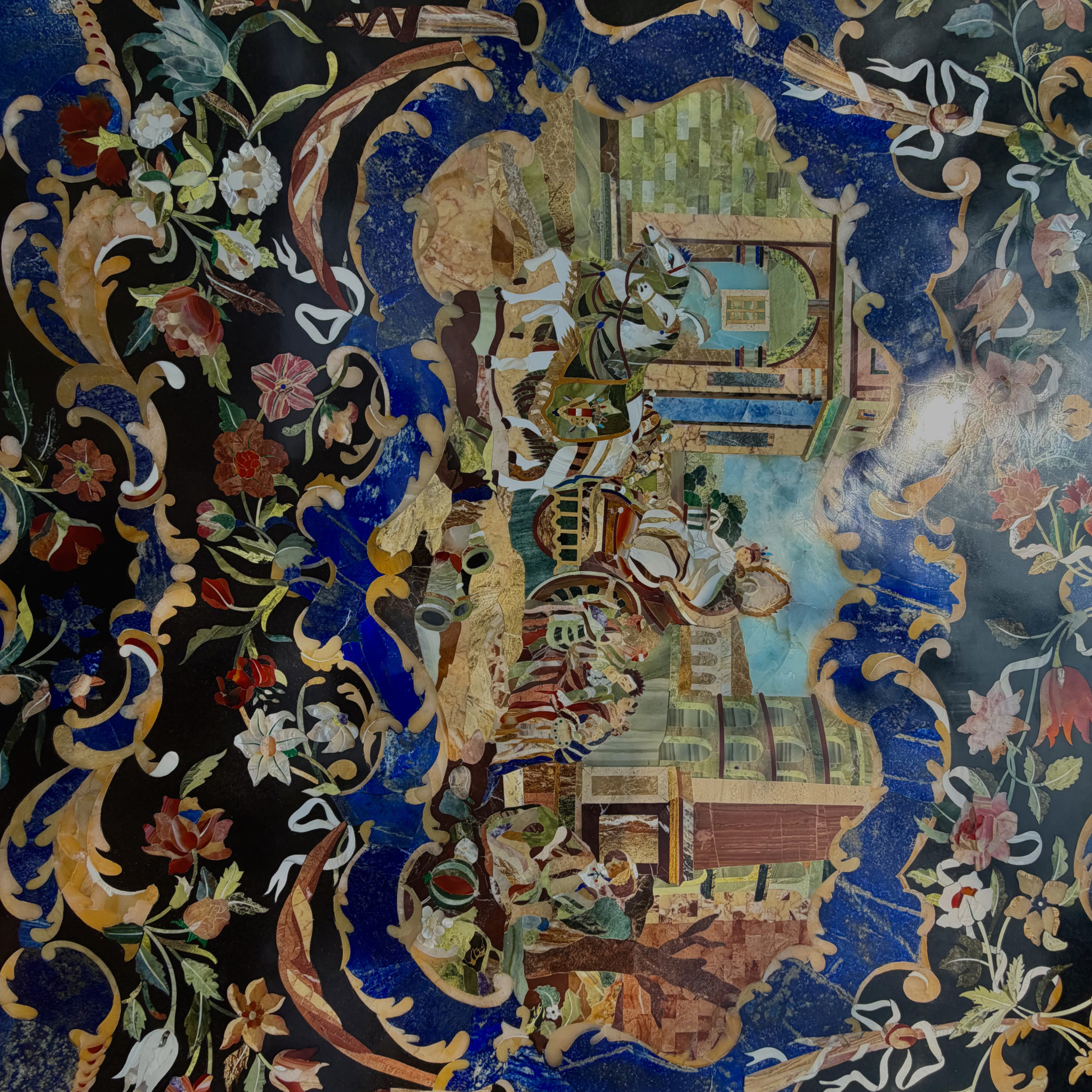 Semi-precious stone inlay table top features intricate pietra dura craftsmanship