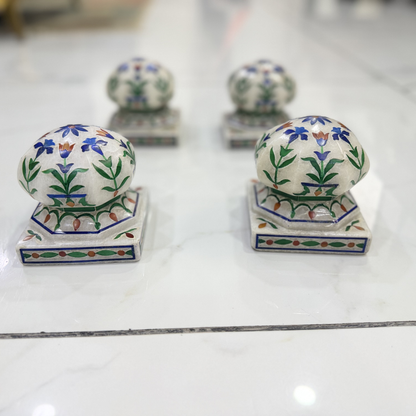 Marble carpet weight, inlaid with semi-precious stones | master of the carpet